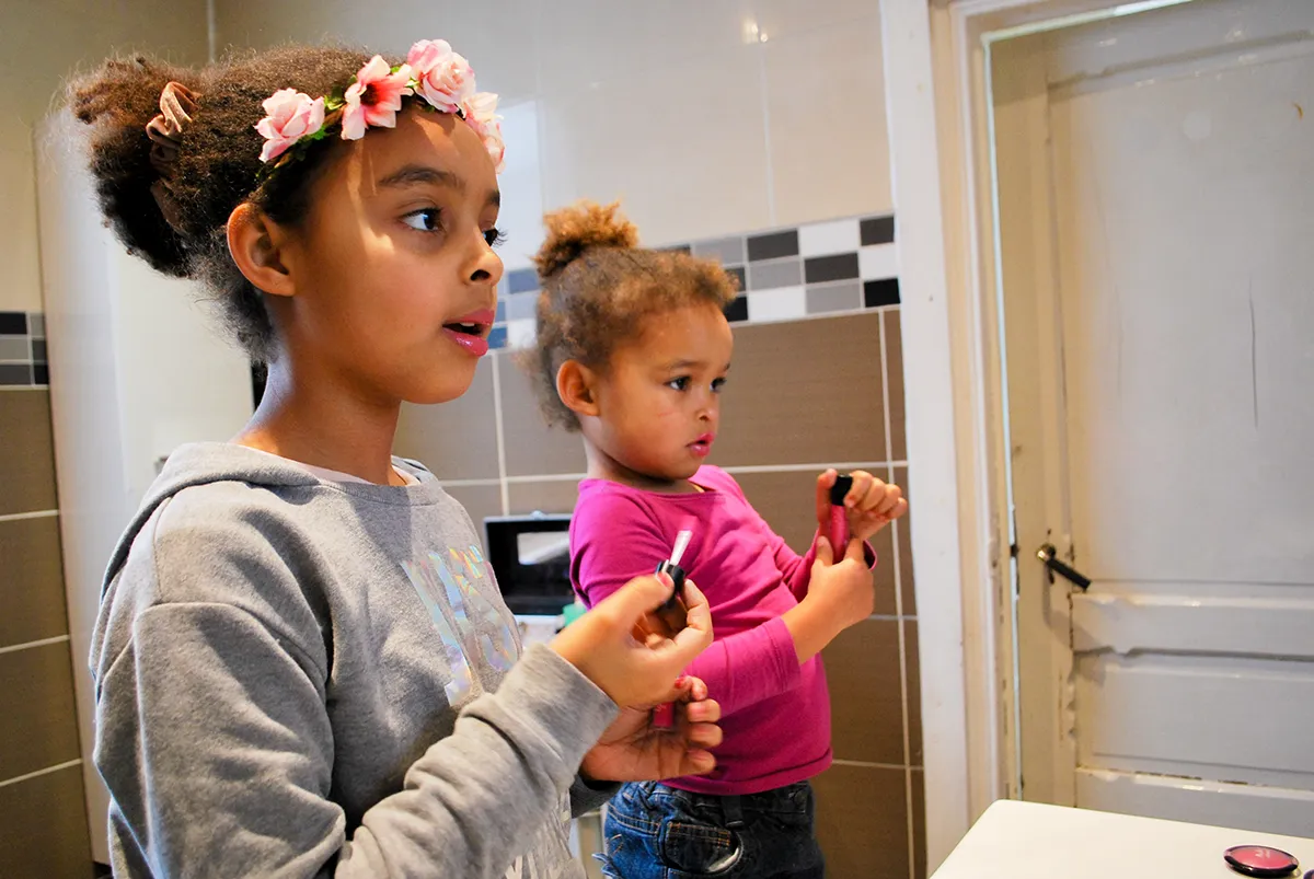 little-black-girls-diverse-sisters-playing-with-m-2023-11-27-05-01-35-utc